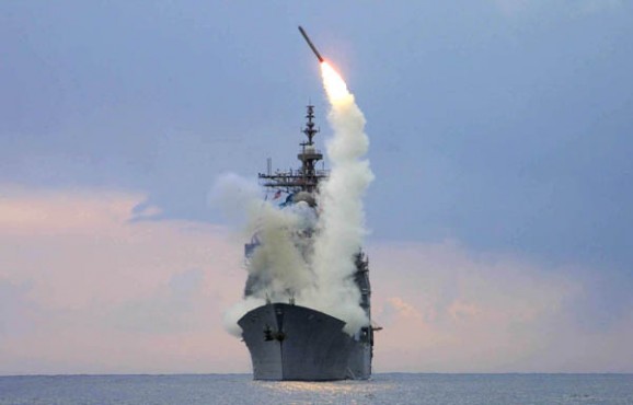 030323-N-6946M-001 ABOARD USS CAPE ST. GEORGE (CG 71) AT SEA -- A Tomahawk cruise missile launches from USS Cape St. George, operating in the eastern Mediterranean Sea in support of Operation Iraqi Freedom. (Photo by IS1 Kenneth Moll, USS Cape St. George) (Released by Sixth Fleet Public Affairs)