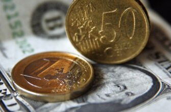 Рубль подрос к доллару и евро